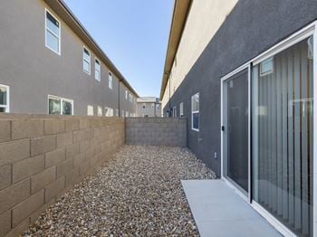Desert sage townhomes private patio with large sliding glass door
